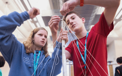 EXPLO students building a bridge in engineering class